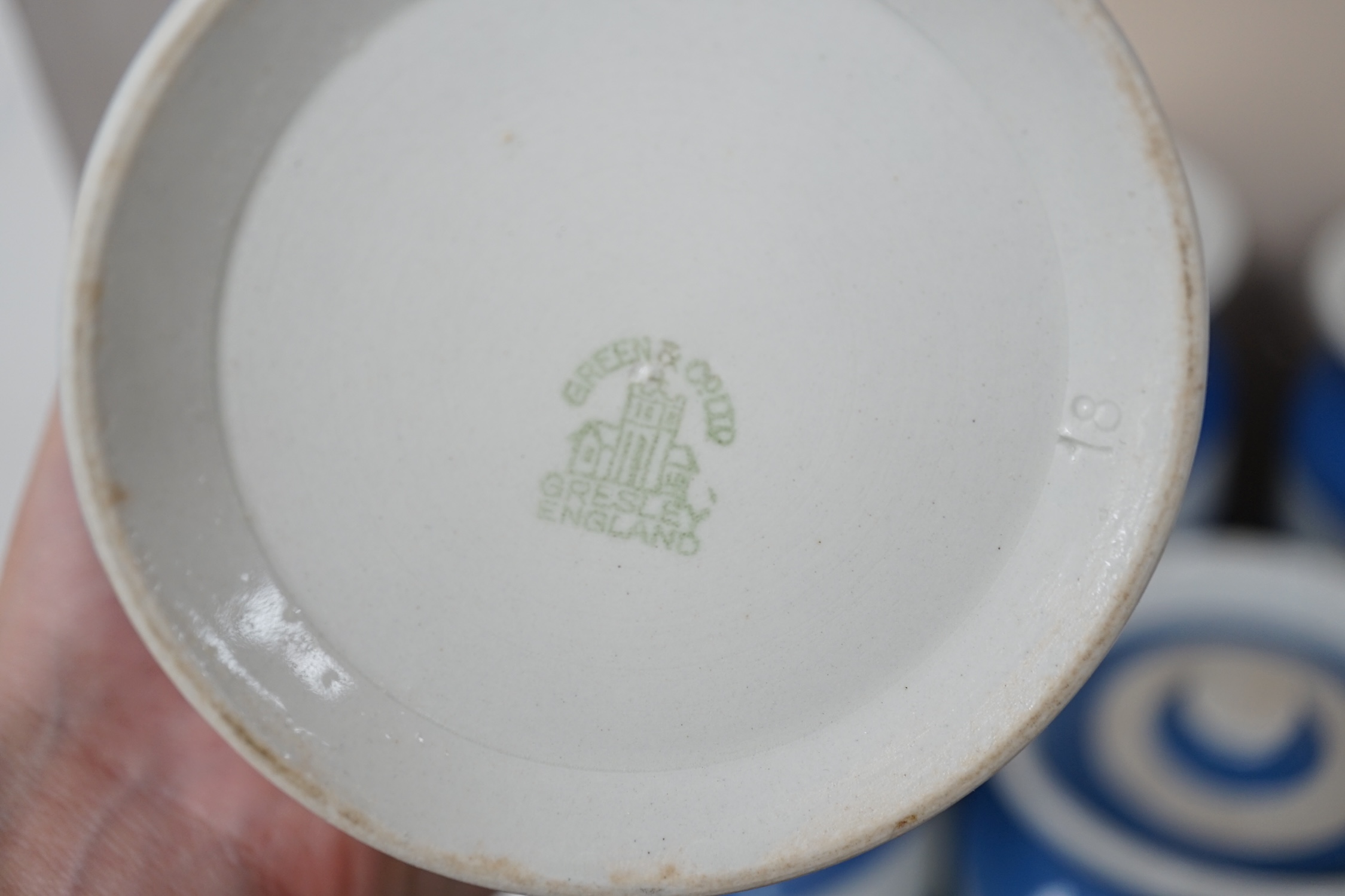 T.G.Green Cornish Kitchenware, eleven lidded storage jars to include Oatmeal, Self Raising Flour, Tapioca, Barley Flour, Granulated Sugar and Sago, largest 19cm high, Green Church marks. Condition - fair and good